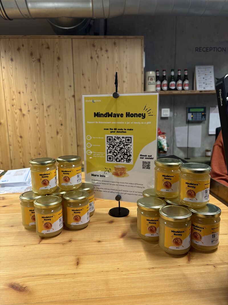 Jars of MindWave Honey from the office beehives, supporting De Ruimtevaart